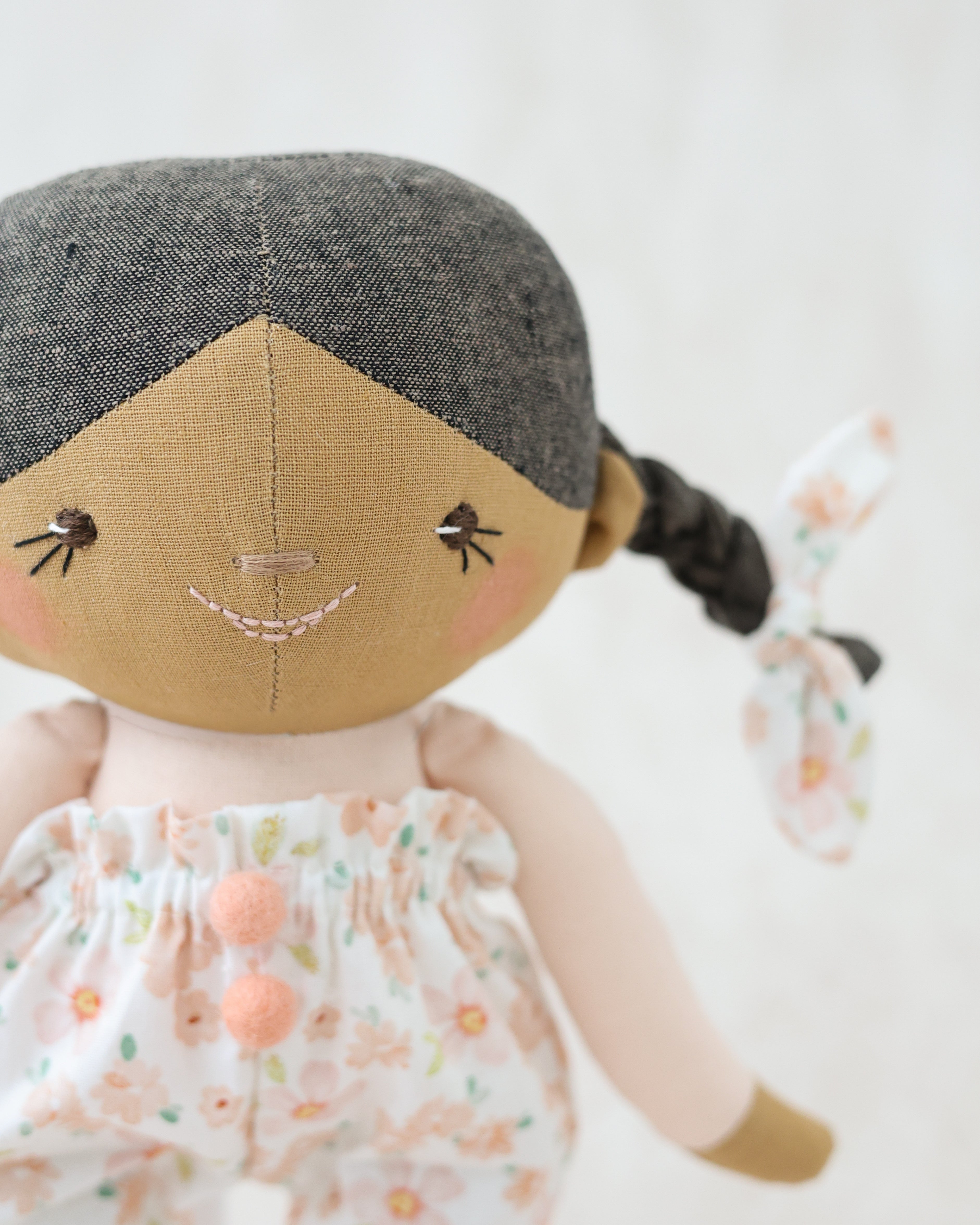 Classic Doll Brown Braids and Floral Jumpsuit